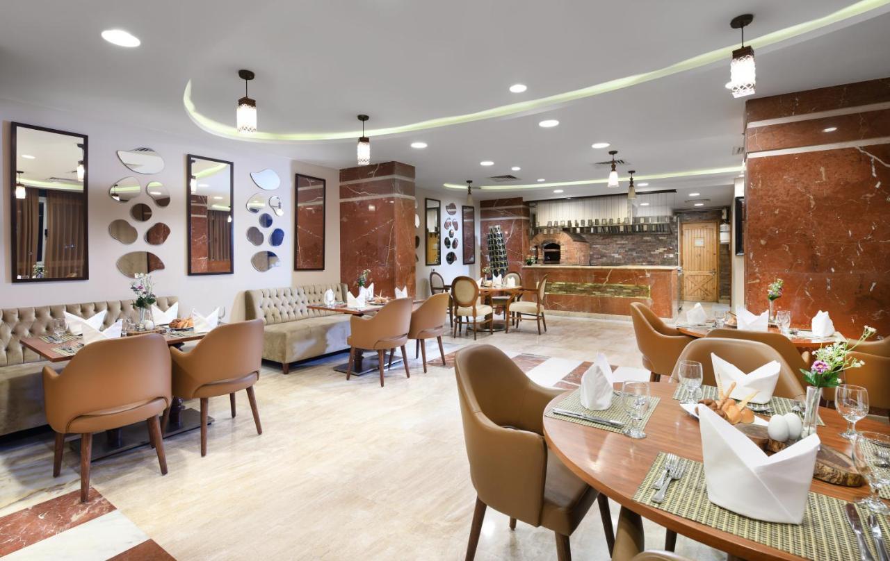 Tolip El Forsan Hotel Ismailia Exterior foto The restaurant